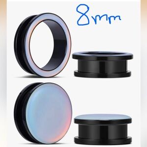 NWT IN BOX Black and Iridescent Ear Plugs